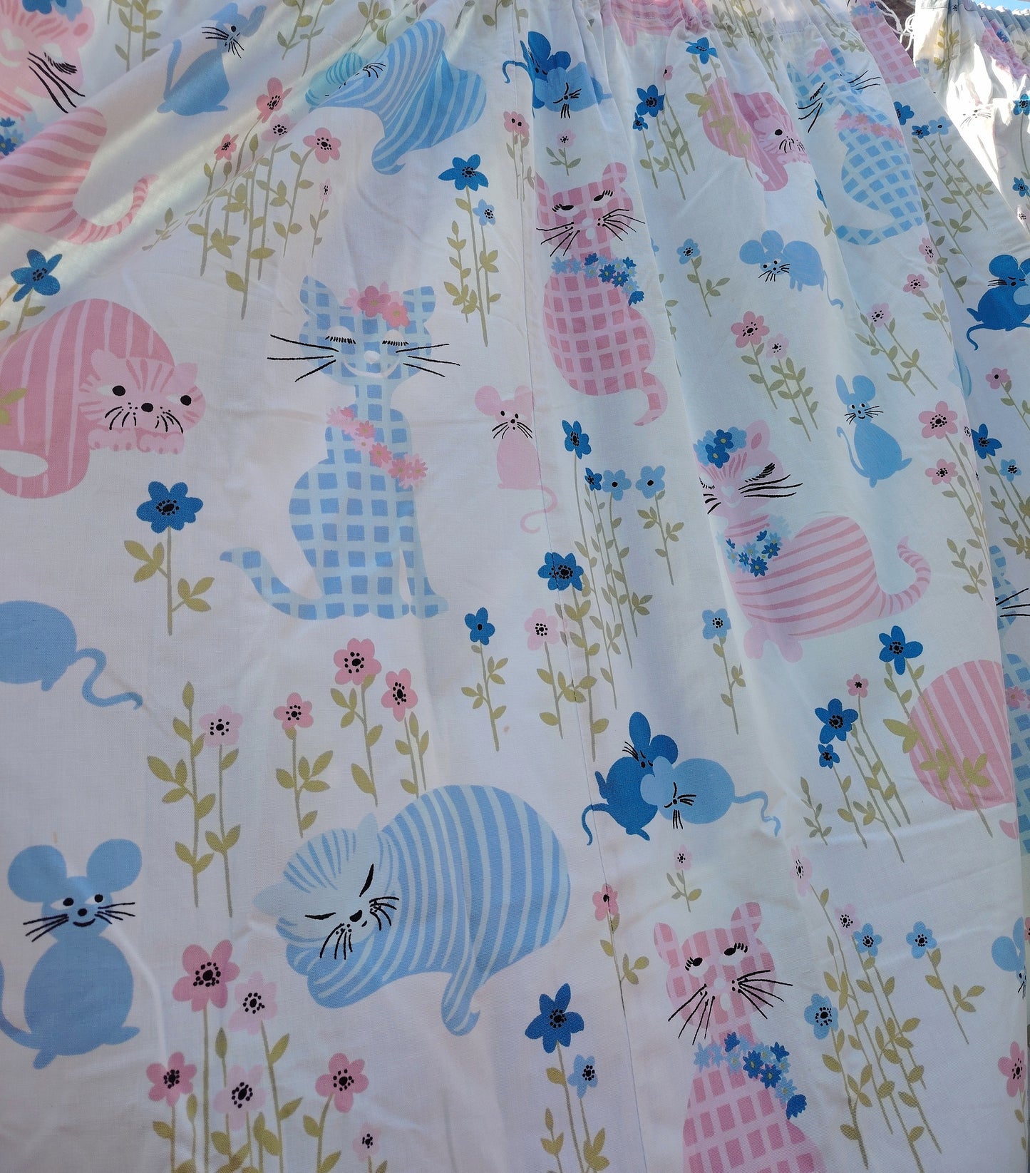 Gorgeous and rare pair of "Puss Puss" Curtains by Sanderson