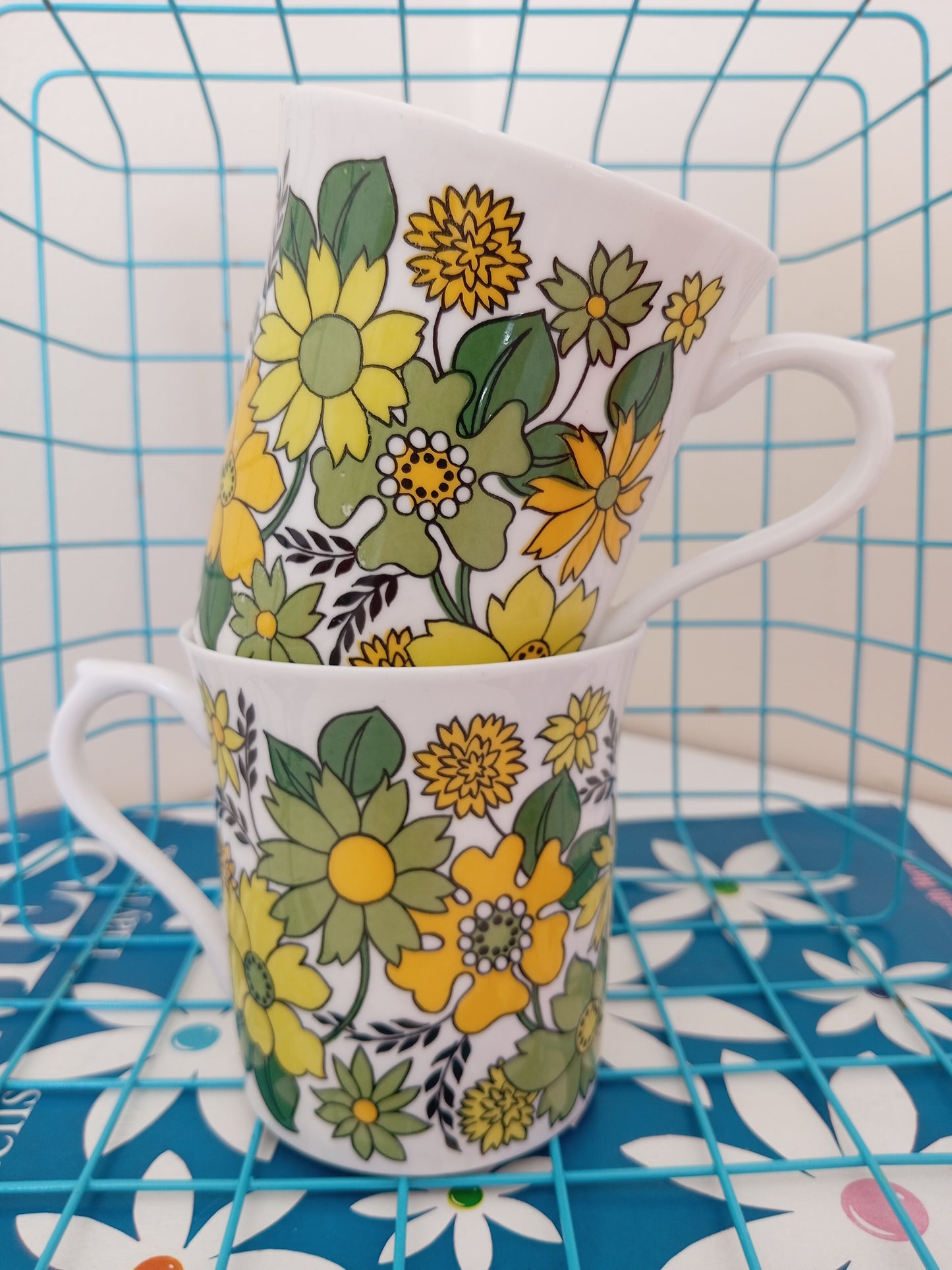 Pair of yellow and green Sandringham flower power mugs