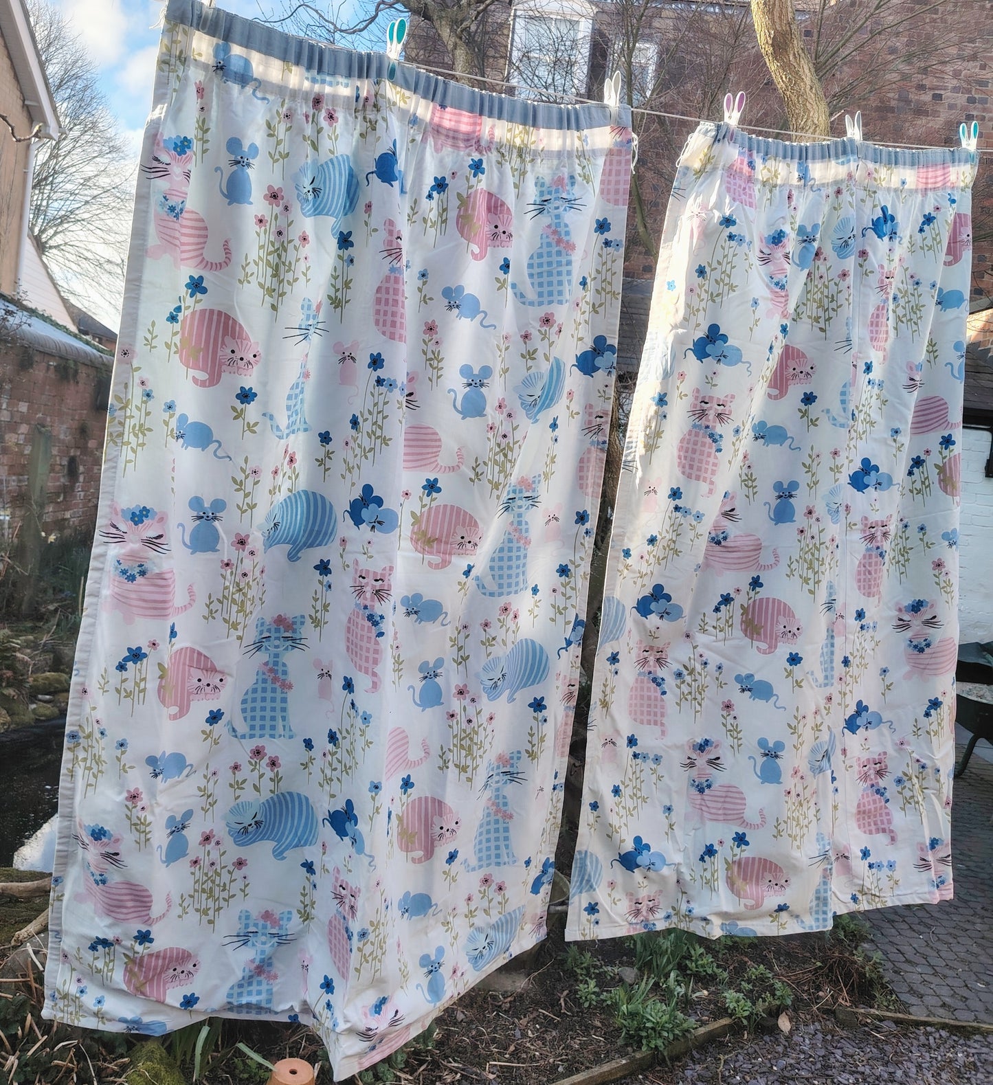 Gorgeous and rare pair of "Puss Puss" Curtains by Sanderson
