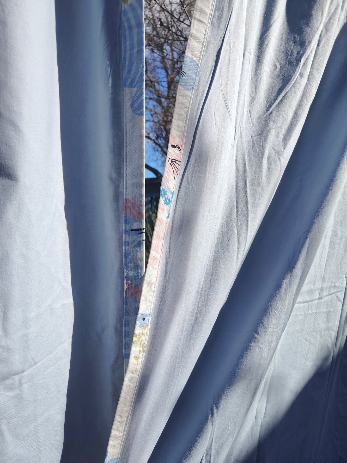 Gorgeous and rare pair of "Puss Puss" Curtains by Sanderson