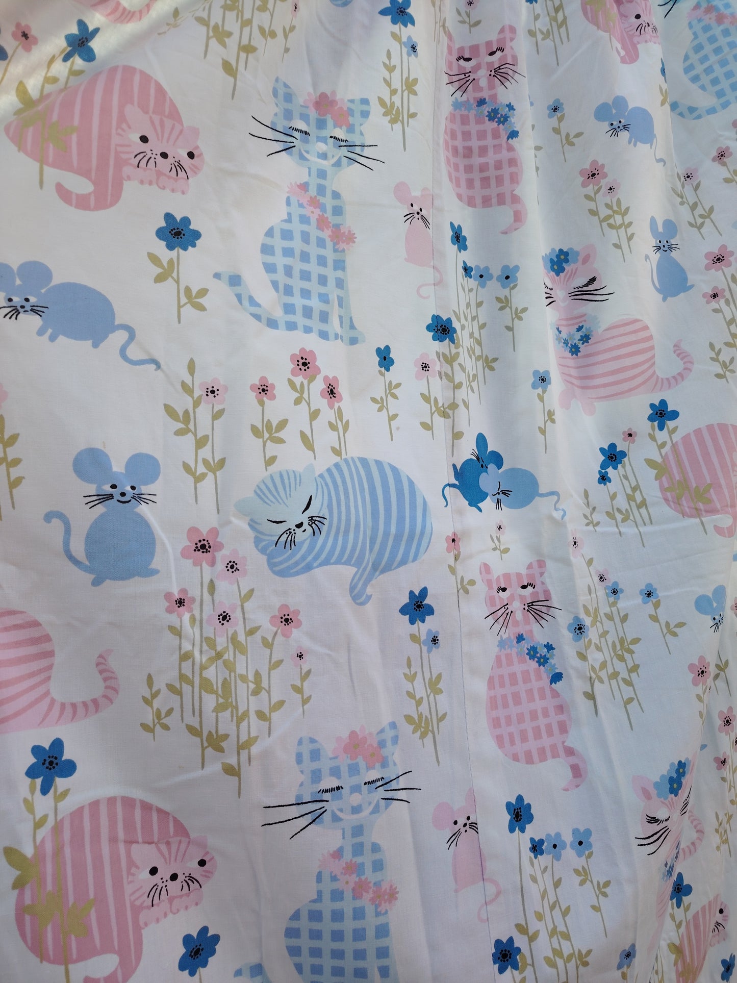 Gorgeous and rare pair of "Puss Puss" Curtains by Sanderson