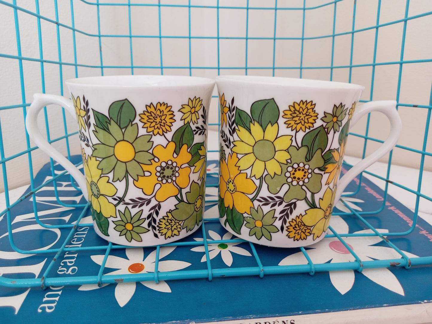 Pair of yellow and green Sandringham flower power mugs