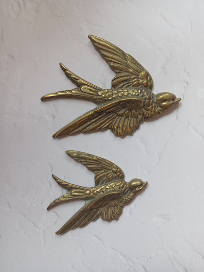 Pair of vintage brass flying swallows