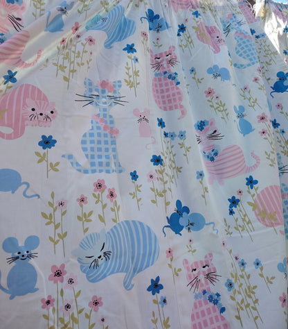 Gorgeous and rare pair of "Puss Puss" Curtains by Sanderson