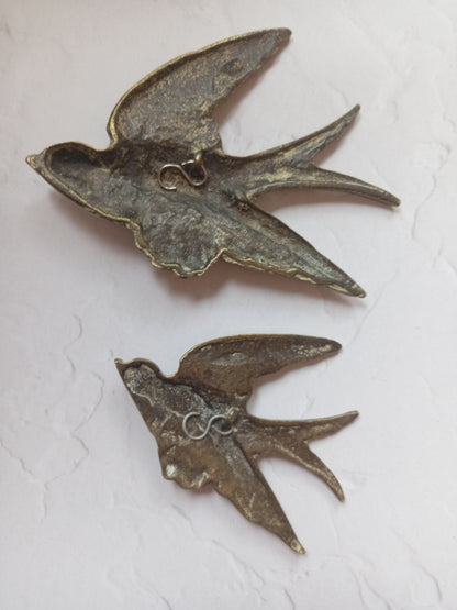 Pair of vintage brass flying swallows