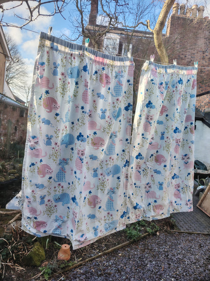 Gorgeous and rare pair of "Puss Puss" Curtains by Sanderson