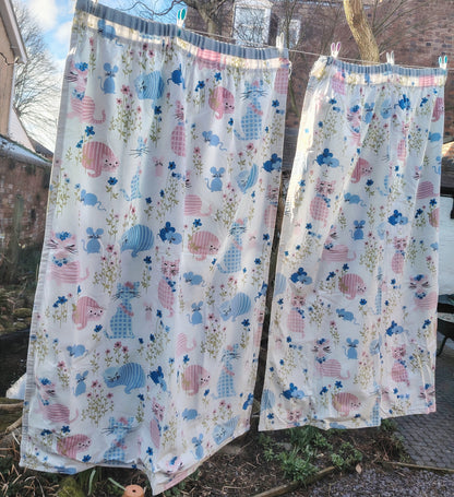Gorgeous and rare pair of "Puss Puss" Curtains by Sanderson