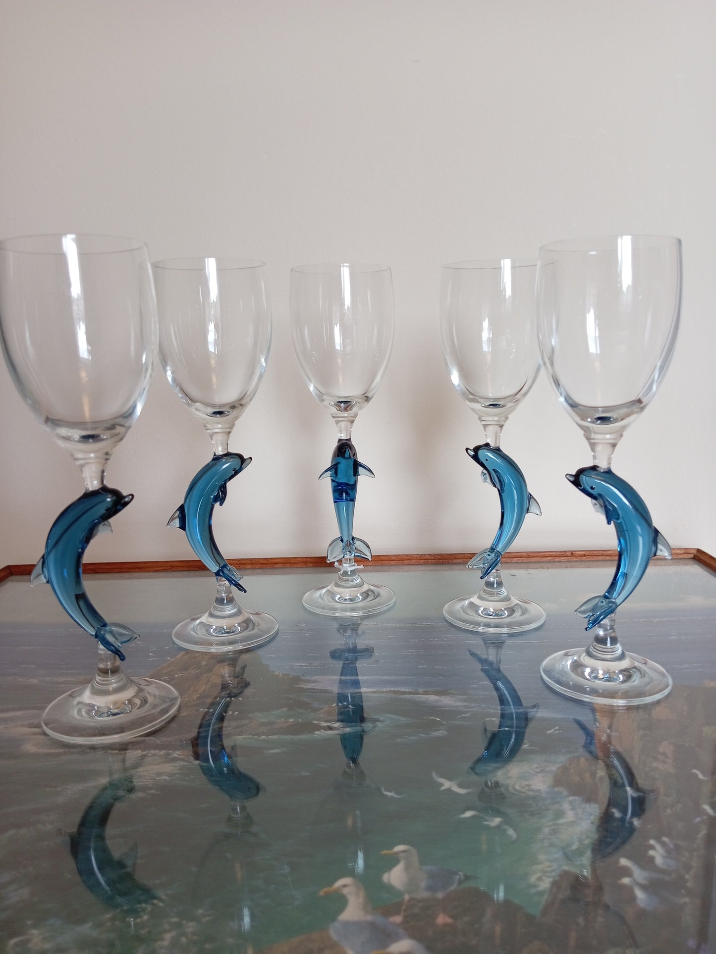 Set of 5 vintage wine glasses with dolphin stems