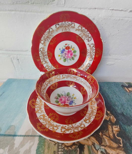 Red and Gold Floral Royal Grafton Fine Bone China Tea Cup, Saucer and side plate.